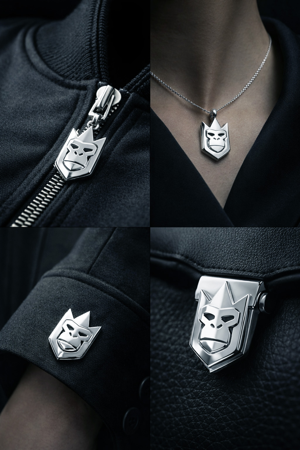 Silver QueenQong crest details across zip pulls, pendants and lapel hardware